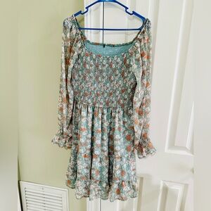 Smocked dress with feminine details